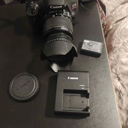 Conon digital camera EOS t7 wiffi and tripod