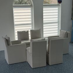 6 PERFECT CREAM LINEN DINING CHAIRS ON CASTERS