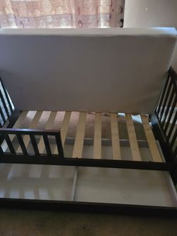 Toddler bed with storage