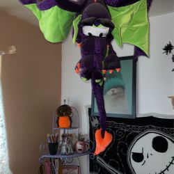 giant stuffed purple dragon  