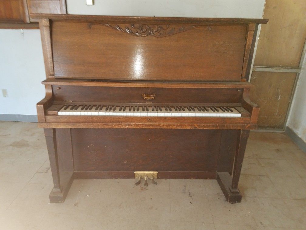 Vintage Howard upright player piano