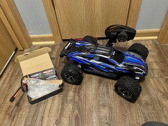 Brand New Traxxas Rustler 4X4 VXL plus 3 Batteries