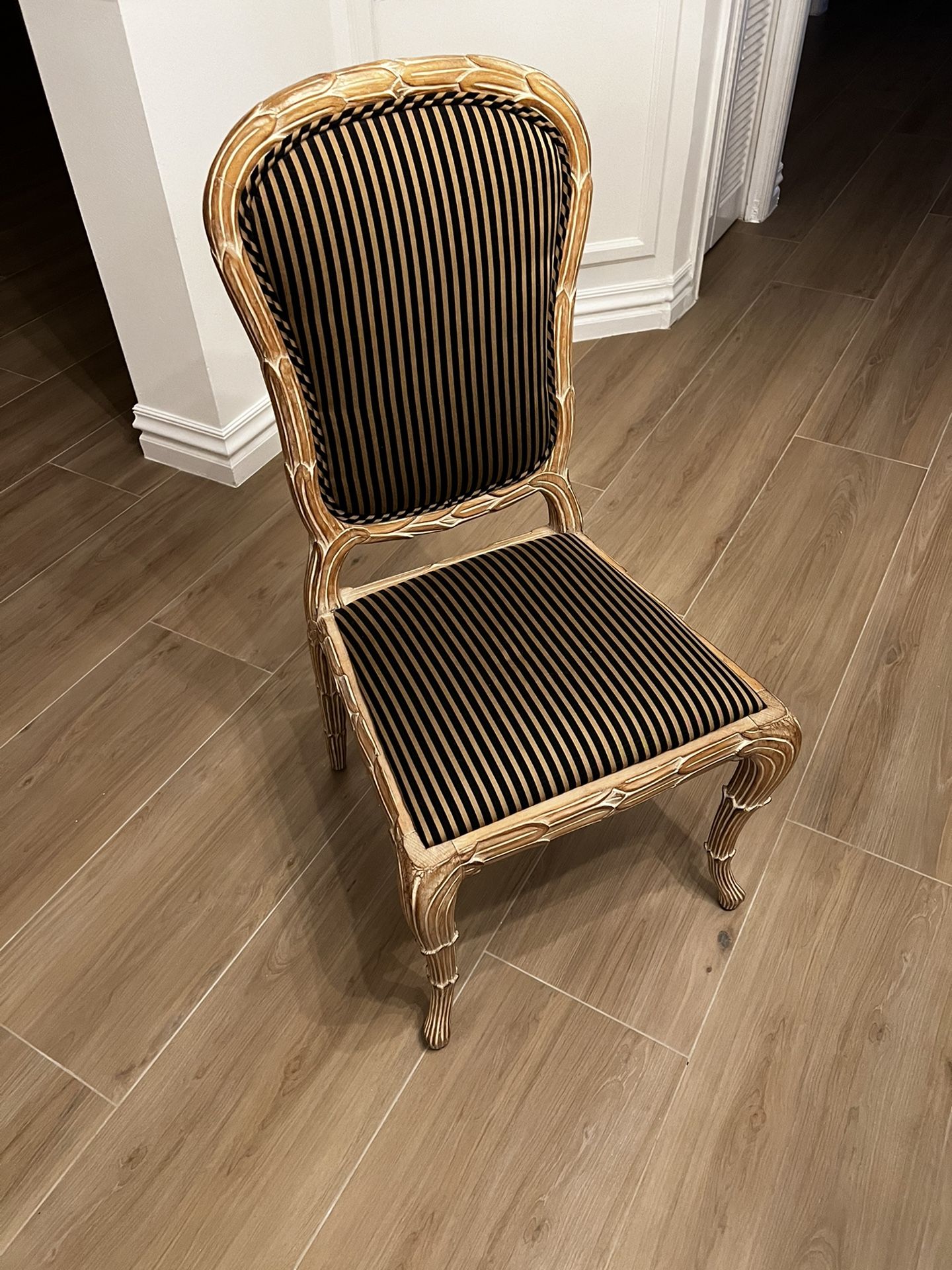 8 Tan and black striped upholstered dining room chairs