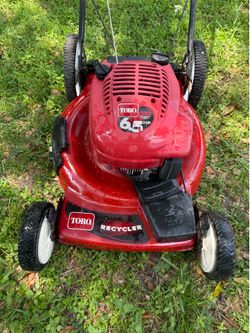 Lawn mower toro start right up good condition front wheel drive self propelled work great