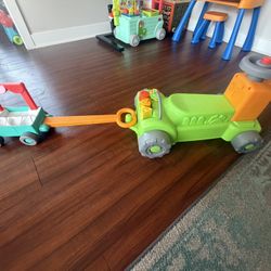 Fisher-Price Laugh & Learn 4-in-1 Farm to Market Tractor Ride-On