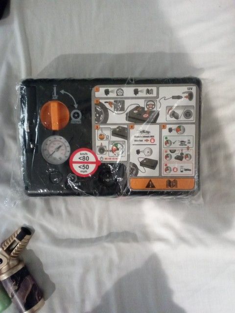 Portable Air Compressor/Emergency Tire Repair Kit