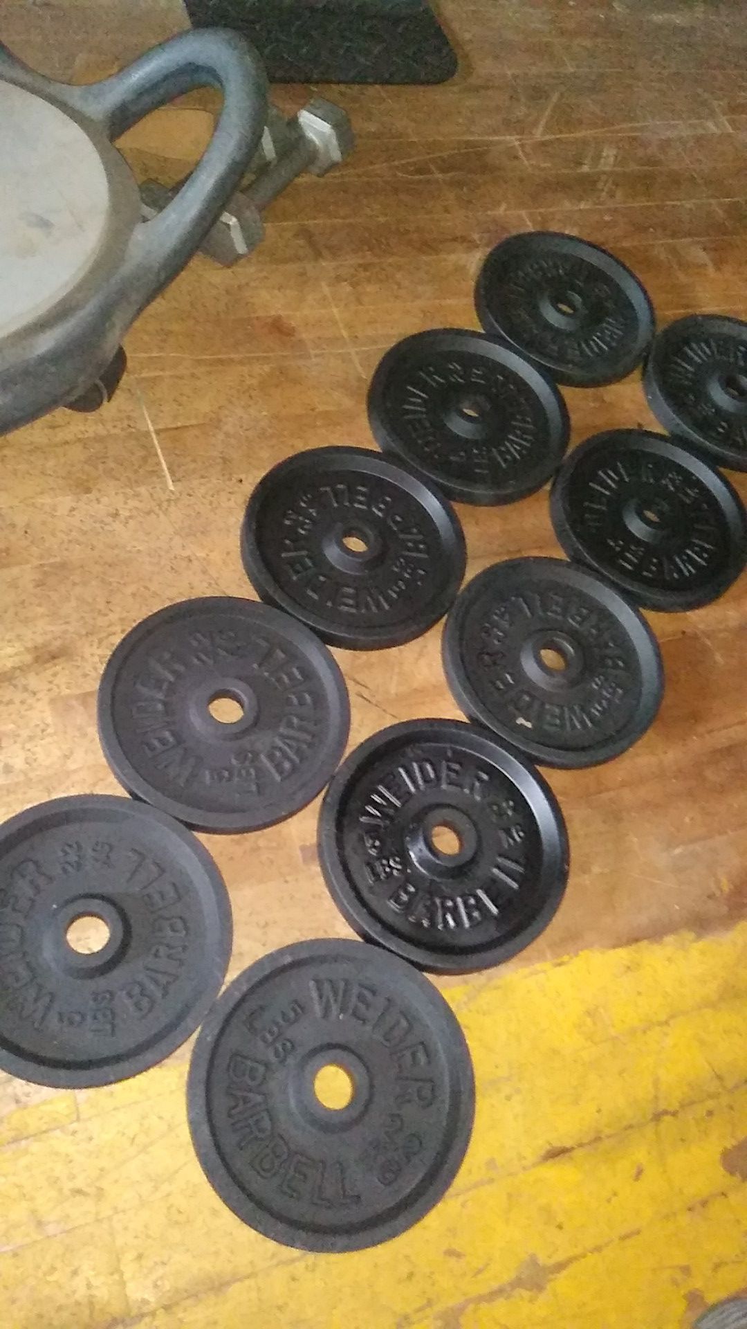 (10) 5 lb Weider barbell standard weight plates(50lbs. Total)
