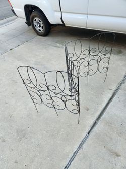 3 pieces of metal yard pickets