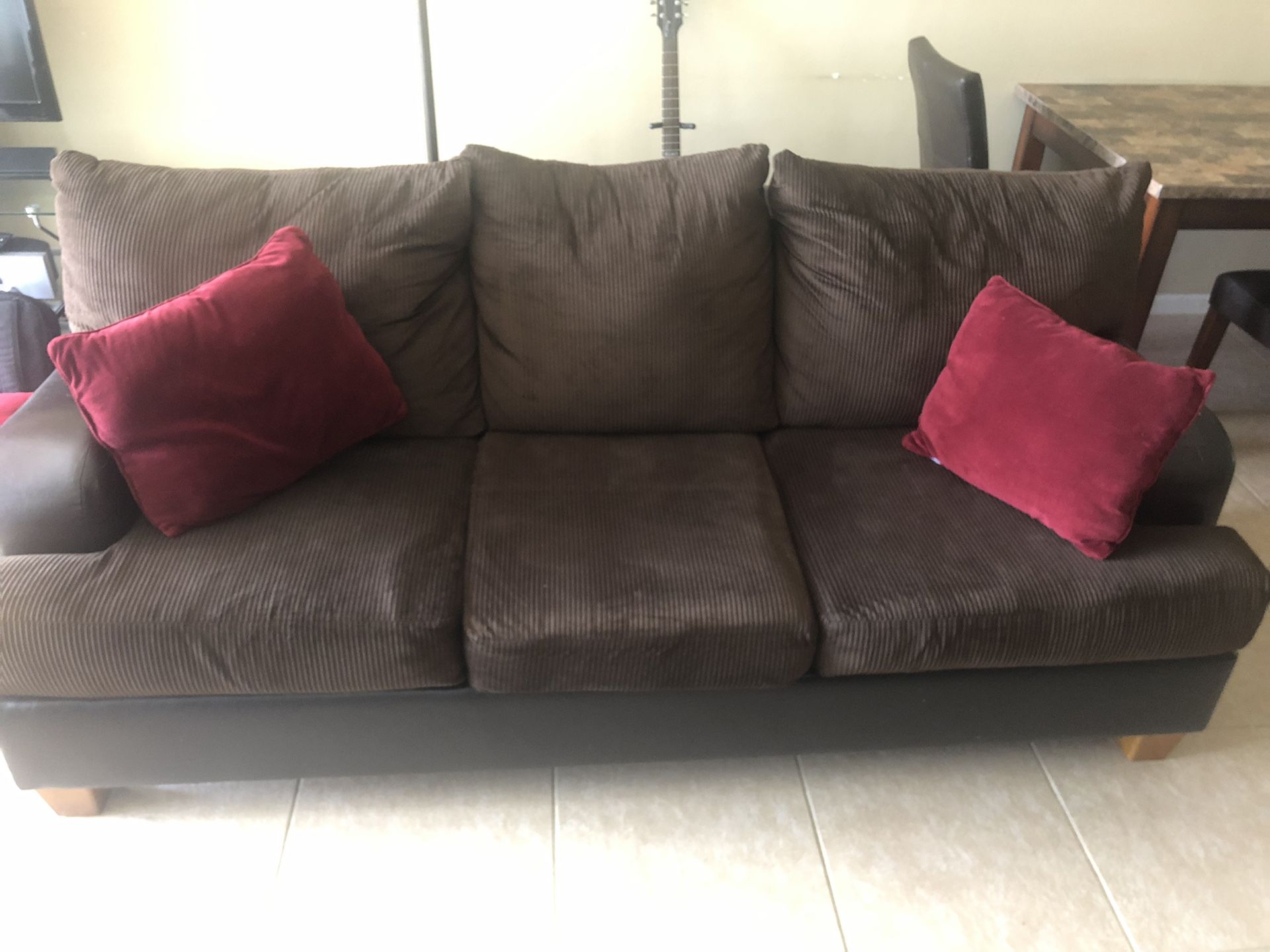 Brown and Leather Couch and Loveseat