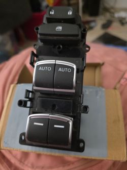 Master power windows switch assembly