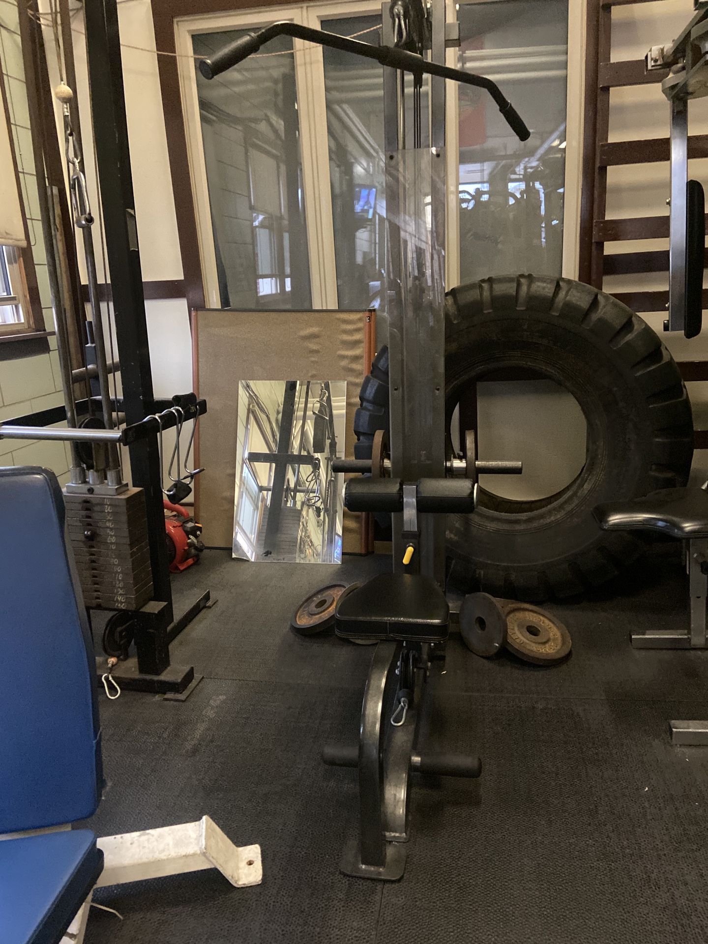 Gym equipment, Olympic free weights, cable crossover and PowerTec lat pull down