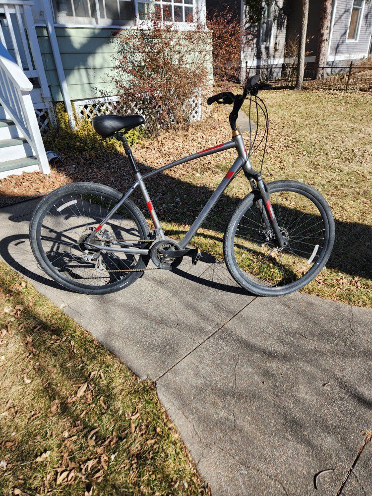 Giant- Cypress Hybrid City/Trail Bicycle with trailer hitch carrier.