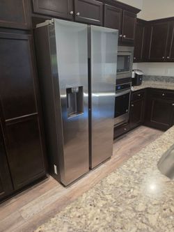 Stainless Steel Side-by-Side Refrigerator with Ice Dispenser