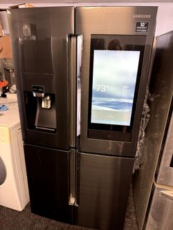 Counter depth Famili Hub stainless steel refrigerator and bottom freezer
