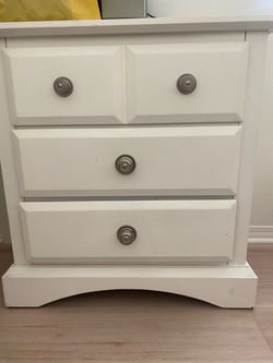 White Wood Dresser with Silver Knobs
