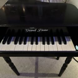 Junior grand piano outlet