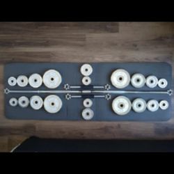 ADJUSTABLE DUMBBELLS AND BARBELL.
