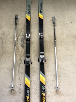 Skis With Bindings And Poles