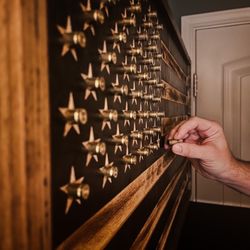 Flag Faced Concealment Cabinet Using Spent Brass Magnetic Key