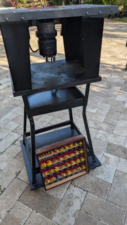 Ryobi 1 3/4" HP Router on table with wheels and 36 bits 