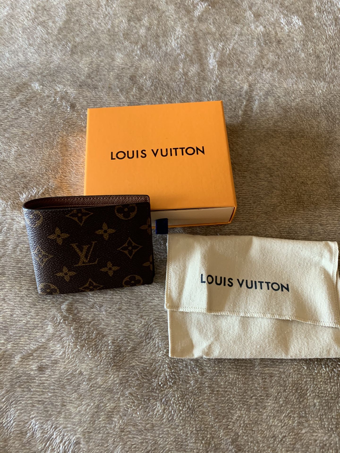 Louis Vuitton MULTIPLE WALLET $160