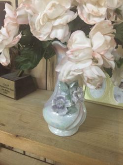 Cute vase with flowers