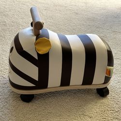 https://offerup.com/redirect/?o=Qi50b3lz zebra ride on toy