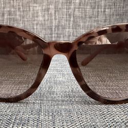 Jessica Simpson sunglasses in a brown tortoise shell design