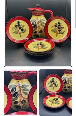 Hand painted ceramic pitcher with lid plus 5 matching small plates. Olive branch pattern, bright yellow with red trim. Pitcher measures 9 inches tall,