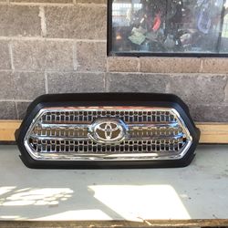 2016 Tacoma Grille Assembly OEM 2023 Brand New Open Box 