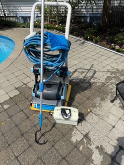 Dolphin Robotic Pool Cleaner with Caddy and Power Supply