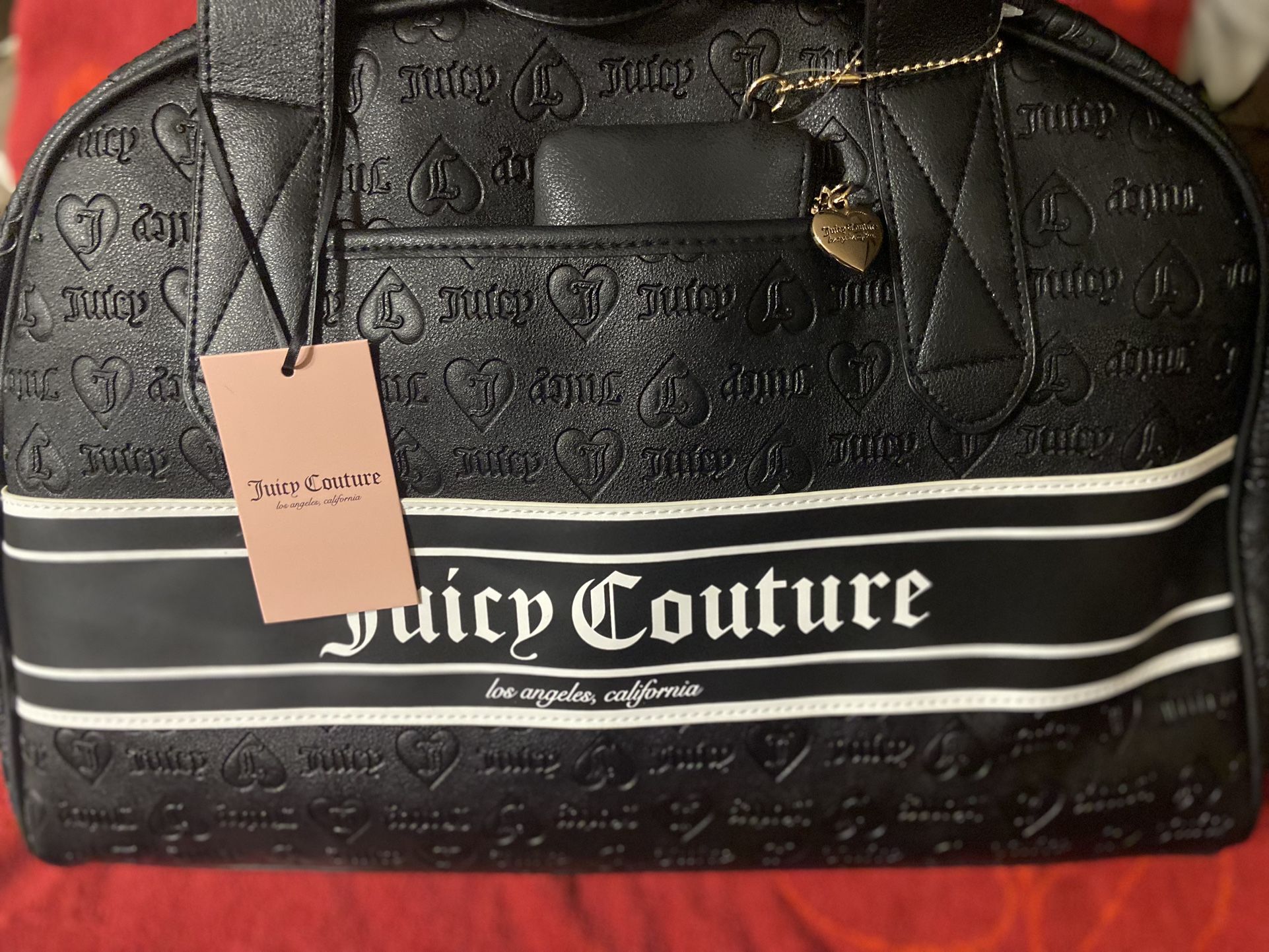 Brand new authentic Juicy Couture Black Embossed Women's Bag NWT