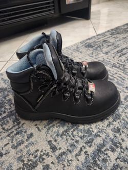 a pair of Avenger Women's Framer Waterproof Composite Toe Work Boots