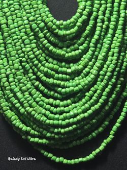 Green multi strand beaded necklace
