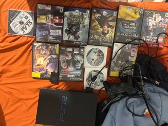 PlayStation 2 with 11 games and memory card
