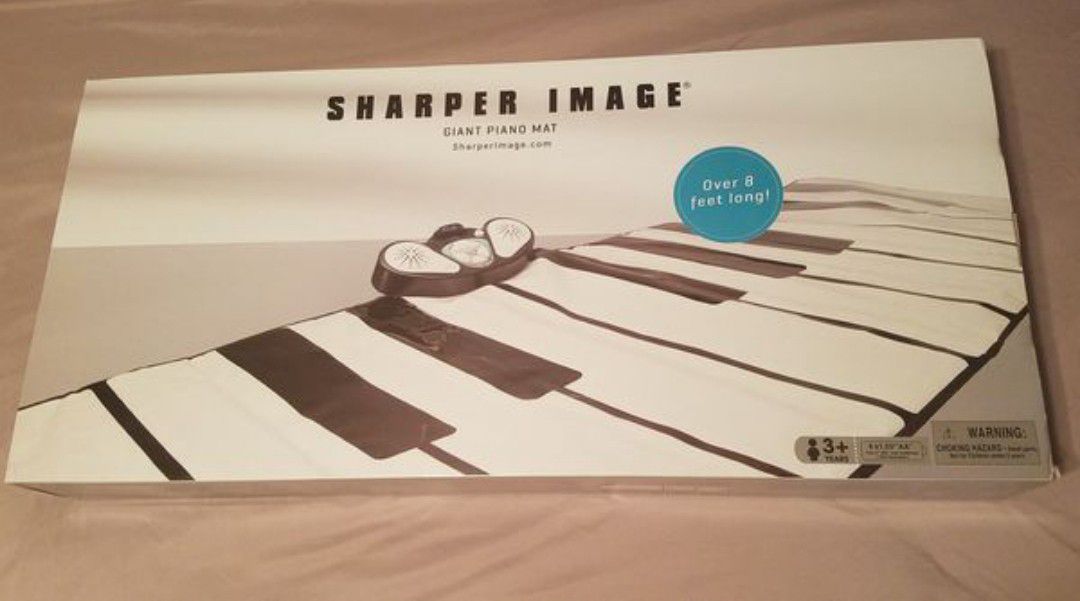 Giant Piano Mat Sharper Image NEW $20