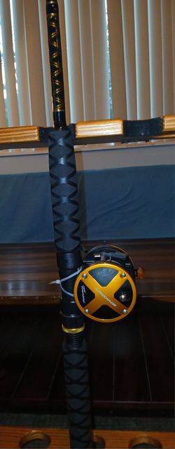 1) New Black& Gold series 30LW Tsunami  on matching Custom grip Tsunami Wreckage graphite 6'6 combo rod