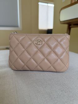 Chanel O case in beige