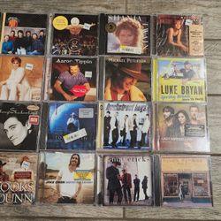 Collection of 16 music cds. All are brand new sealed. $30 for all 16