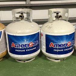 4 Empty Propane Tanks