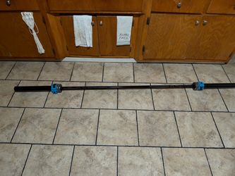 The Atlas fitness Titan Olympic bar with collars