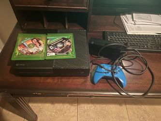 Xbox one and controller with 2 games