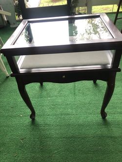 Bombay end glass table