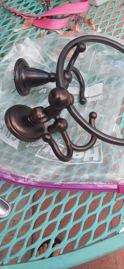 Brown metal towels hol outder.