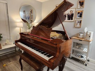 Schafer and Sons Polished Cherry wood grand piano