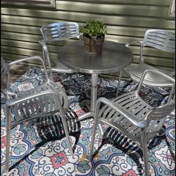 Metal Table and Four Chairs 
