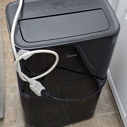 1 Year Old  13,500 Btu Midea Portable  Ac Unit