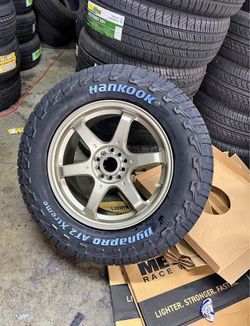 New Wheels & Tires Package Deal NS1507 Bronze Wheels 245/65R17 Hankook Dynapro AT2 Extreme Tires