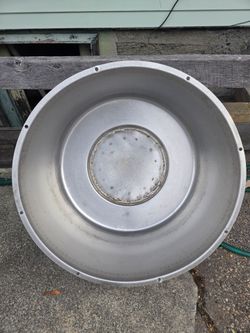 large, round metal stock pot, measuring roughly 22" across