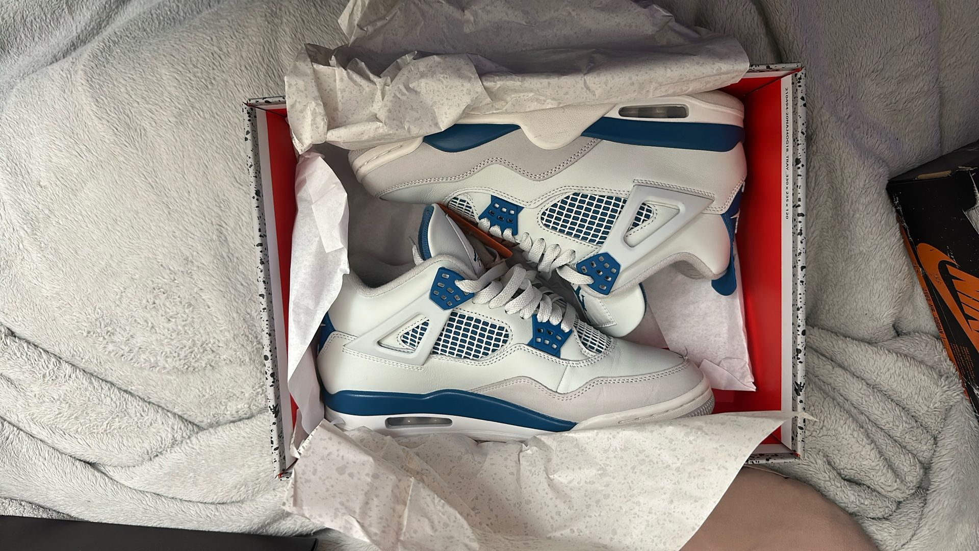 Military Blue Jordan 4